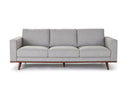 A gray upholstered Olwyn Sofa with a full wood base and wide track arms, presented against a white background.