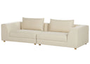 Light beige sofa with cushions on a white background