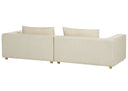 Back view of a light beige sofa with two cushions on a white background