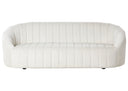 Off-white sofa with a quilted texture on a white background