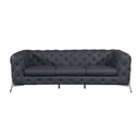 Front view of a grey tufted sofa with chrome legs on a white background.