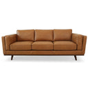 Front view of a tan leather sofa with a dark brown base and legs finish on a white background.