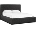 Dark gray upholstered bed with white bedding on a white background
