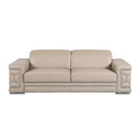 Front view of a beige leather sofa with decorative armrests on a white background.