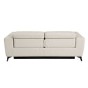 Rear view of a beige power recliner leather sofa on a white background.