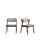 Two wooden chairs with gray cushions in a room with abstract art on the wall.