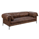 Three-quarters of a mocha brown leather sofa on a white background.