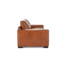 Side view of a Kennon contemporary leather loveseat in a tan or medium-brown color, featuring two large back cushions, two seat cushions, wide square arms, and low-profile dark block feet.