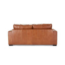 Rear view of a Kennon contemporary leather loveseat in a tan or medium-brown color, and low-profile dark block feet.