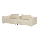 Three-quarters view of a Lermon contemporary sofa, appearing as two modular sections, in a light beige textured fabric with wide arms, two loose back cushions, and short, light wood cylindrical legs.