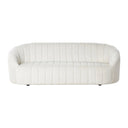 Off-white sofa with a quilted texture on a white background