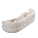 Three-quarters top view of an off-white curved cushion on a white background.