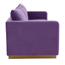 Side view of a purple sofa with a gold base on a white background.