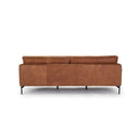Rear view of a brown leather sofa on a white background.