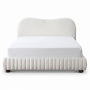 Cream upholstered bed with textured base on a white background