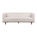 Front view of a Skaule mid-century modern sofa in an off-white textured fabric, with vertical channel stitching on the back and inner arms, two seat cushions with piping, and a dark wood base with tapered legs.