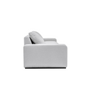 Side view of a gray sofa on a white background.