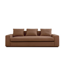 Front view of a rust sofa with three cushions on a white background.