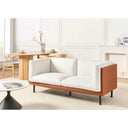 Off-white sofa with wooden frame in a modern living room setting.