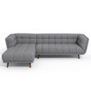 Adele 103-inch ash grey fabric left-facing sectional sofa with grid button-tufted upholstery and dark wood tapered legs on a white background.
