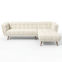 Adele 103-inch cream bouclé right-facing sectional sofa featuring grid-tufted fabric and tapered wooden legs set against a plain white background.