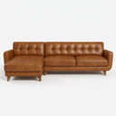 Adriana 111-inch tan genuine leather left-facing sectional sofa featuring a grid-tufted backrest and tapered wooden legs on a white background.