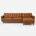 Adriana 111" tan genuine leather right-facing sectional sofa featuring a mid-century modern design with button-tufted back cushions, a right-side chaise lounge, and tapered wooden legs, shown isolated on a white background.