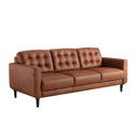 A three-quarter view of the Armando leather sofa, highlighting the biscuit-tufted back, the clean lines of its track arm, and its rich caramel color.