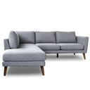Bianca 97-inch grey fabric left-facing sectional sofa with a modern chaise lounge and tapered dark wood legs isolated on a plain white background.