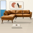 Bianca 97-inch tan genuine top-grain leather left-facing sectional sofa with tapered wooden legs in a modern living room setting.
