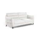 A three-quarter view of the Bianca contemporary sofa, featuring white leather upholstery and horizontal channel-tufting on the back and arms, with dark tapered legs against a white background.