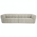 Burntwood 114-inch light brown chenille power slider sofa featuring vertical channel tufting and rounded pillow arms against a white background