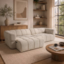 Burntwood 114-inch light brown chenille power slider sofa with channel-tufted cushions and extended seat in a modern living room