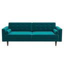 Casey mid-century modern teal velvet upholstered sofa featuring a button-tufted back, matching cylindrical bolster pillows, and tapered dark wood legs on a white background.