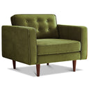 Casey mid-century modern olive green velvet armchair featuring a button-tufted back cushion, wide track arms, and tapered dark wood legs.