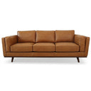 Chase 90 mid-century modern tan genuine top-grain leather sofa with tapered wooden legs, isolated on a white background.