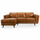 Chase 91-inch mid-century modern tan genuine leather left-facing sectional sofa featuring a chaise lounge, plush cushions, and tapered dark wooden legs on a white background.