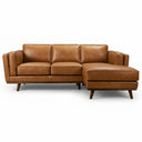 Chase 91-inch tan genuine leather right-facing sectional sofa with plush seat cushions and mid-century modern tapered wooden legs on a white background