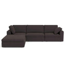 Concetta 121-inch dark gray fabric modular sectional sofa featuring a left-facing chaise ottoman and matching side pillows, displayed against a white background.