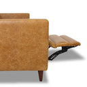 Close-up of the side view of the Cora 94" tan leather electric reclining left-facing sofa featuring top-grain leather upholstery, and tapered wooden legs on a clean white background.