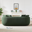 Dina 85-inch modern olive green boucle sofa from the rear view in a living room.