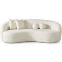 Enzo 89-inch Japandi ivory bouclé curved sofa with two matching square throw pillows and two round sphere accent pillows, isolated on a white background.