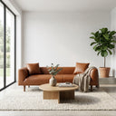 Modern minimalist living room featuring the Erling 86 cognac vegan eco-leather sofa, styled with a beige knit throw, round wooden coffee table, and a large potted fiddle-leaf fig plant.