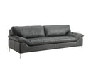 A three-quarter view of the Giorgia modern leather sofa in black, highlighting its grid-stitched seat, plush draped arms, and slender polished metal legs.