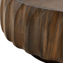 Close-up of a wooden table with a ribbed surface design.