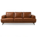 Front view of the Kaia 98-inch tan genuine leather sofa, a modern three-seater couch with plush cushions and sleek black metal legs, isolated on a white background.