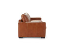 A side profile view of the Kennon sofa, showcasing the clean, geometric lines of its frame, the wide track arm, and its low-profile block feet.