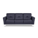A front view of a dark blue contemporary modern leather sofa with buttonless tufting and chrome metal legs in a white back ground.