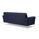 A back view of a dark blue contemporary modern leather sofa with buttonless tufting and chrome metal legs in a white back ground.