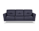 A black contemporary modern leather sofa with buttonless tufting and chrome metal legs in a white back ground